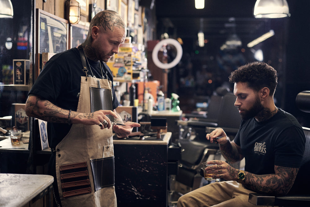 Professional barber using Dark Stag tools